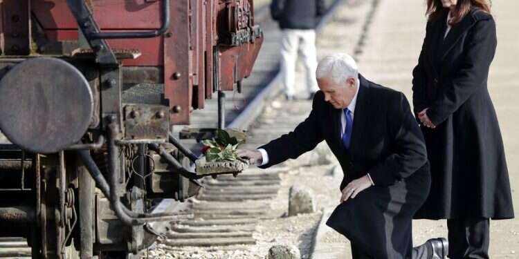 US vice president makes his first Auschwitz visit, takes aim at Iran