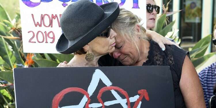 Hundreds gather at vigil to honor synagogue attack victims