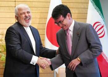 Visiting Japan, Iranian FM blasts US sanctions