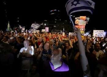 Israelis protest moves to grant Netanyahu immunity, limit Supreme Court