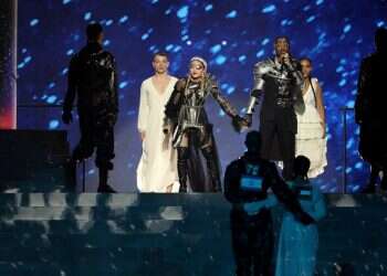 Netherlands wins Eurovision; Madonna's Palestinian flag display causes stir