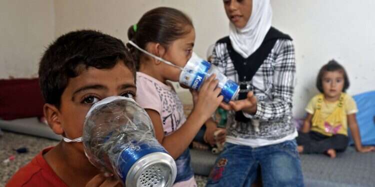 US sees signs Syria may be using chemical weapons, warns of quick response