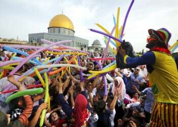 Moon sightings, politics play a part in Muslim holiday