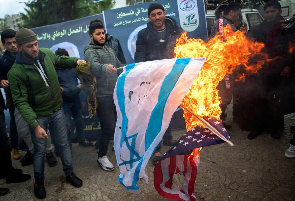 Paying tribute to Iran’s Soleimani, Gazans torch US, Israeli flags ...