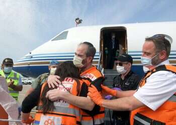 United Hatzalah founder lands in Israel after recovering from COVID-19