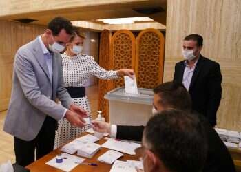 Syrians vote for new parliament under strict COVID procedures