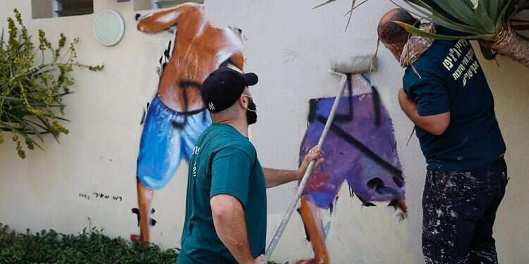 Tel Aviv erases iconic 'Peeping Toms' beach mural after suspected gang rape