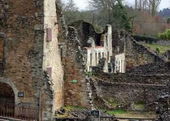 Holocaust-denying graffiti found on wall in French village sacked by Nazis