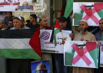 Gazans burn Israeli, US flags in protest over UAE normalization deal