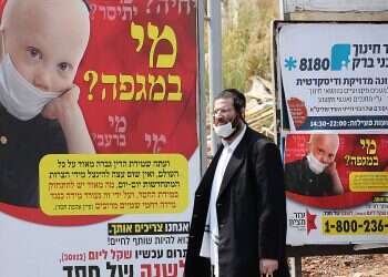 Health Ministry struggles with obstinate Haredi enclaves as leading rabbi tests positive