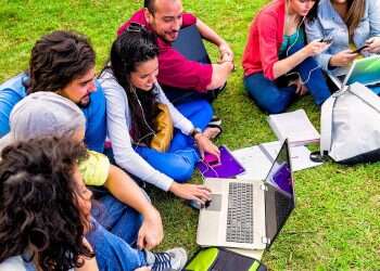 Group of college students studying at university campus