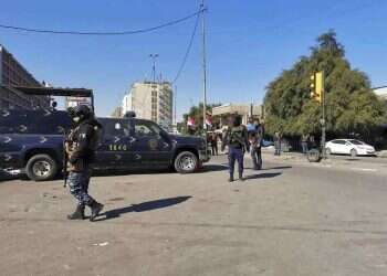 Twin suicide bombings in Baghdad leave at least 13 dead