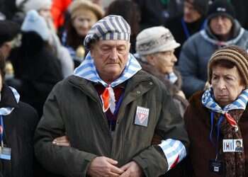 Holocaust survivors vaccinated against COVID on anniversary of Auschwitz liberation