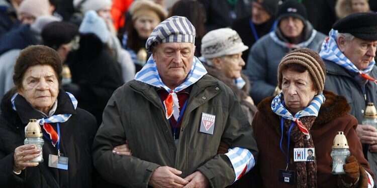 Holocaust survivors vaccinated against COVID on anniversary of Auschwitz liberation