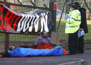 Pro-Palestinian activists in UK chain themselves to gates of Elbit factory