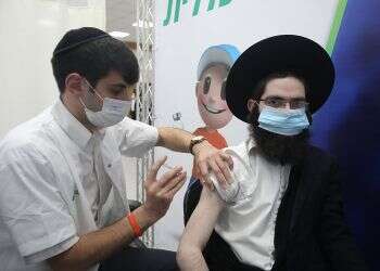 Haredi COVID morbidity declines as more ultra-Orthodox get inoculated