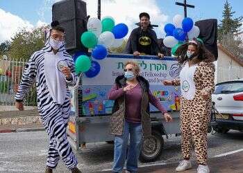 'Happiness Vehicle' allows Purim celebrations to continue during COVID