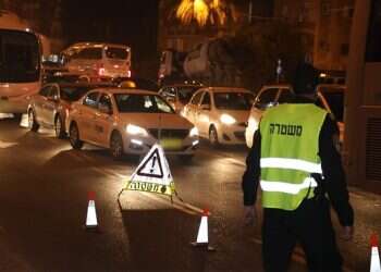 Police set up roadblocks as Israel enters Purim curfew