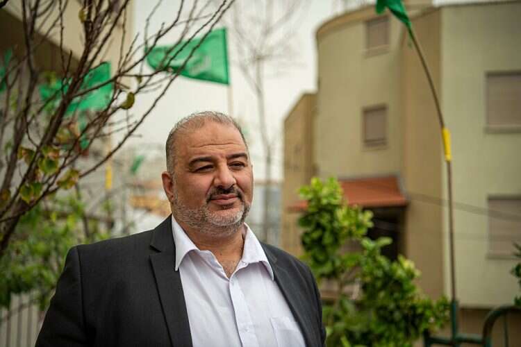 Ra'am party head Mansour Abbas is seen outside of his home in the northern Israeli village of Maghar, March 24, 2021