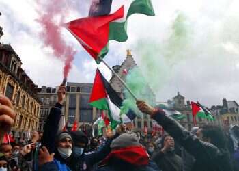 European cities see anti-Israel protests, Paris police use tear gas at banned march