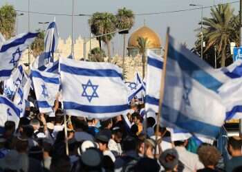 Flag march held in Jerusalem amid riots in city, threats from Hamas