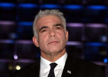 Lapid: Polish law to limit WWII restitutions 'a disgrace'