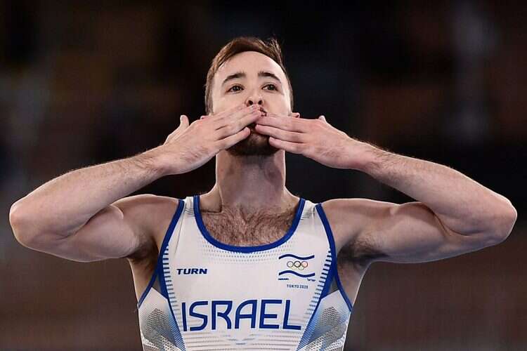 Israel's Artem Dolgopyat celebrates after competing in the floor event of the artistic gymnastics men's floor exercise final during the Tokyo 2020 Olympic Games, Aug. 1, 2021