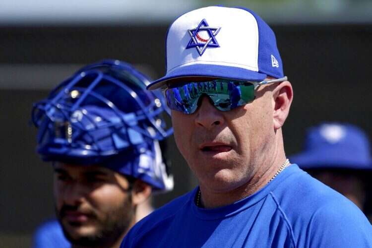 Israel Olympic baseball manager Eric Holtz watches his team practice