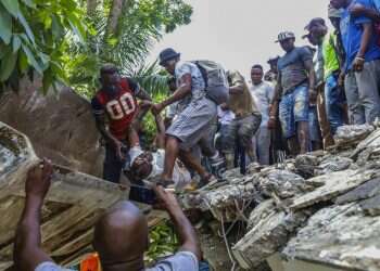 At least 304 dead, 1,800 hurt as powerful quake slams Haiti