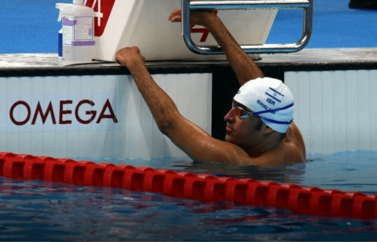 Iyad Shalabi in the pool, shortly after winning the gold medal in the 100-meter backstroke final