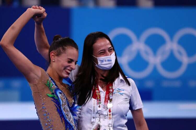 Rhythmic gymnast Linoy Ashram celebrates her win with coach Ayelet Zussman at the 2020 Tokyo Olympics, Saturday