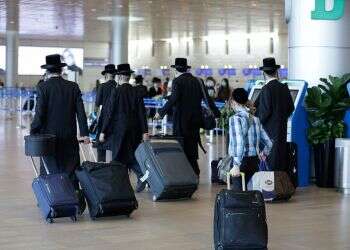 Dozens of Israelis returning from Uman fake negative COVID tests