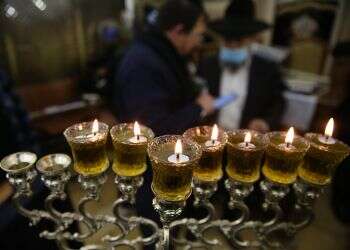 Hungarian Jewry celebrates Hanukkah 'with utmost caution'