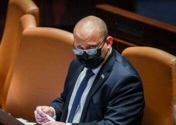 Bennett in quarantine after COVID case reported on flight from UAE