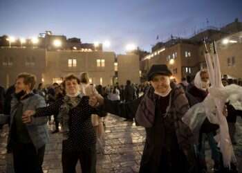 Darkness into light: Holocaust survivors celebrate Hanukkah at Western Wall