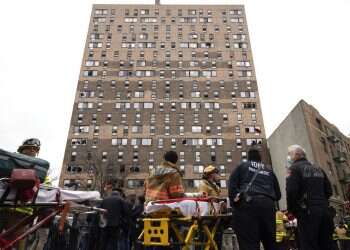 19 dead, including 9 children, in Bronx apartment fire