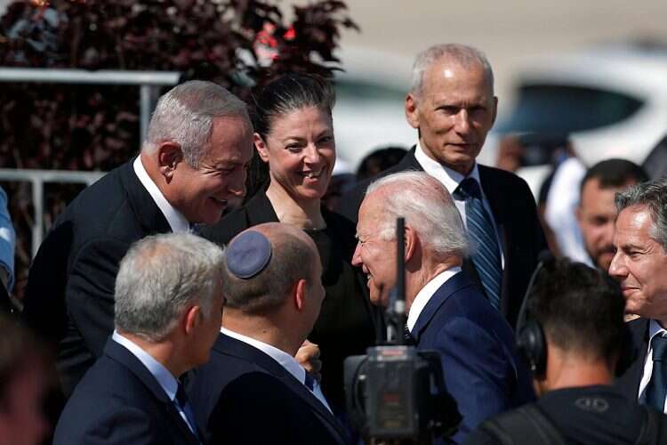 US President Joe Biden (R) is greeted by then-Leader of the Opposition Benjamin Netanyahu (R) upon his arrival at Ben Gurion Airport, in Lod, near Tel Aviv, Israel, 13 July 2022