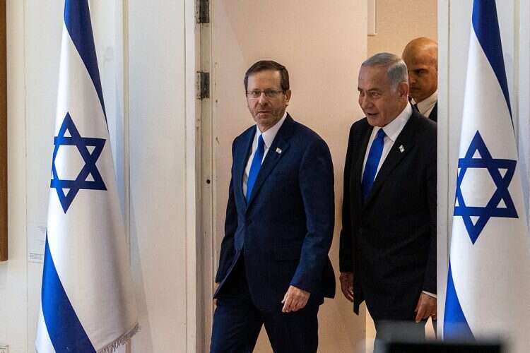 Opposition Leader Benjamin Netanyahu (right) with President Isaac Herzog after the latter gives him a nod to form a government, November 2022