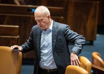 Gallant hangs on after dismissal as Netanyahu hits pause of reform