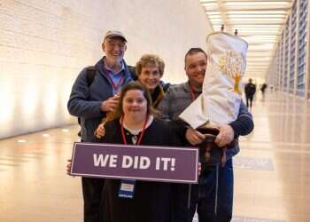 Defying horrors of Holocaust, Torah scroll makes aliyah