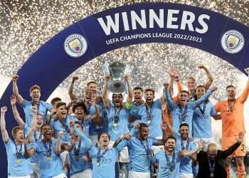 'We made history' Manchester City soccer team hail treble success