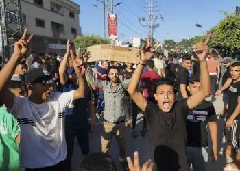 Thousands take to streets in Gaza in rare public display of discontent with Hamas