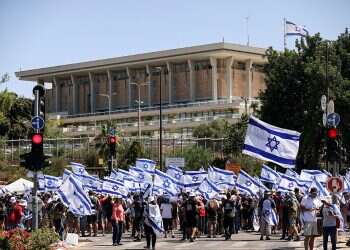 Protesters block road leading to Knesset as MKs poised to pass key bill