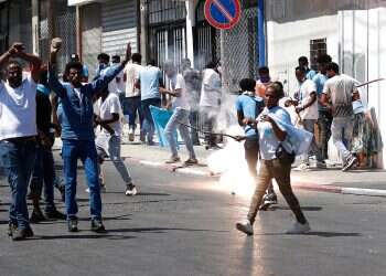 Israel to weigh deporting Eritreans after violent Tel Aviv clashes