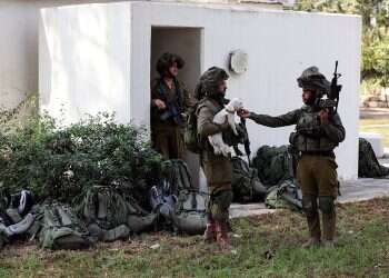 Foreign press see horrific aftermath in visit to kibbutz taken over by Hamas