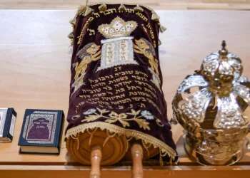 Torah scroll, hidden during Holocaust, brought to Yad Vashem after survivor finds it