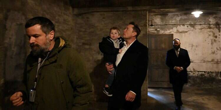 Elon Musk visits Auschwitz, says he is 'aspirationally Jewish'