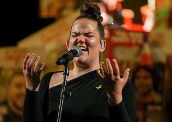 On a bed of tomatoes: Netta Barzilai sports a Spanish-inspired look