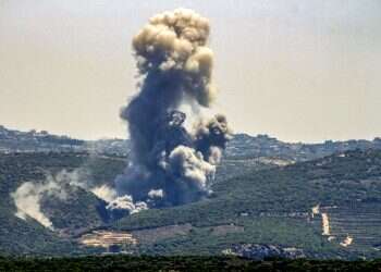 Hezbollah fires scores of rockets after IDF takes out senior operative