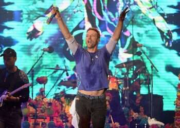 WATCH: Israeli hostages' solidarity tag displayed to thousands at Coldplay concert